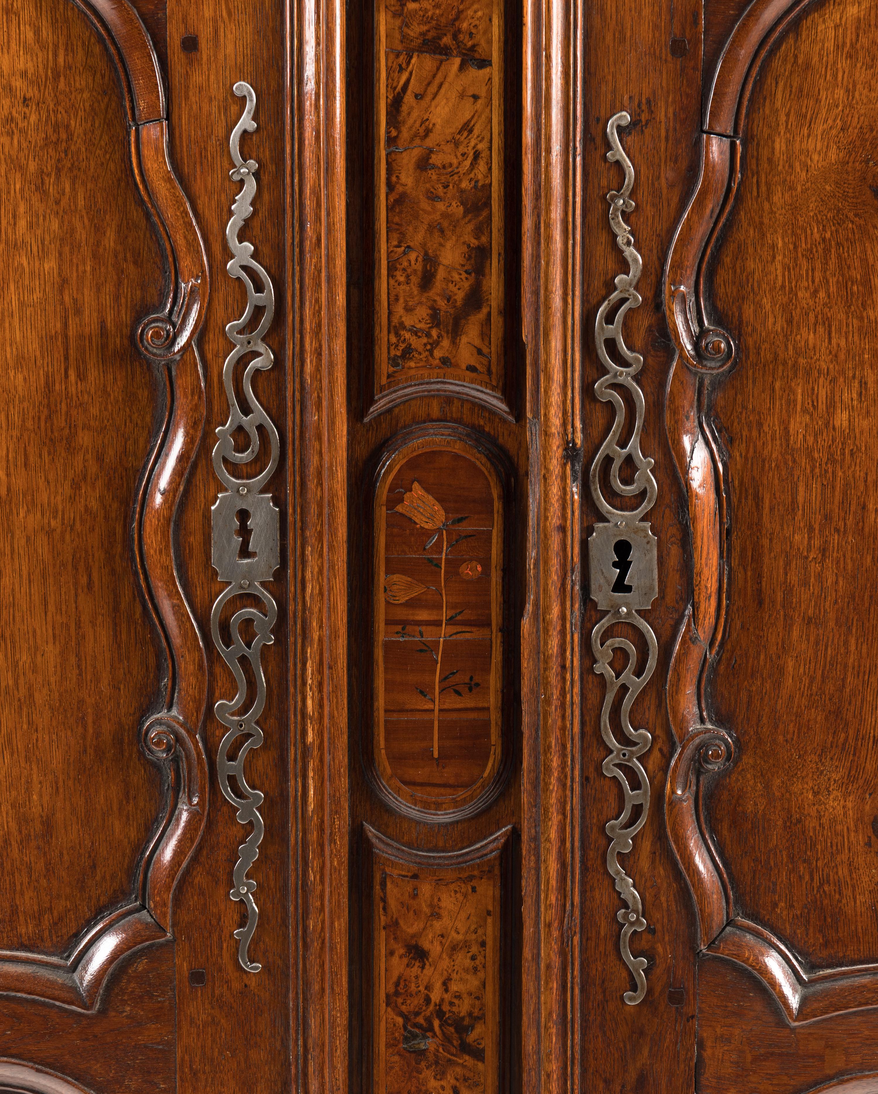 A Louis XV Walnut and Mulberry Marquetry Armoire
