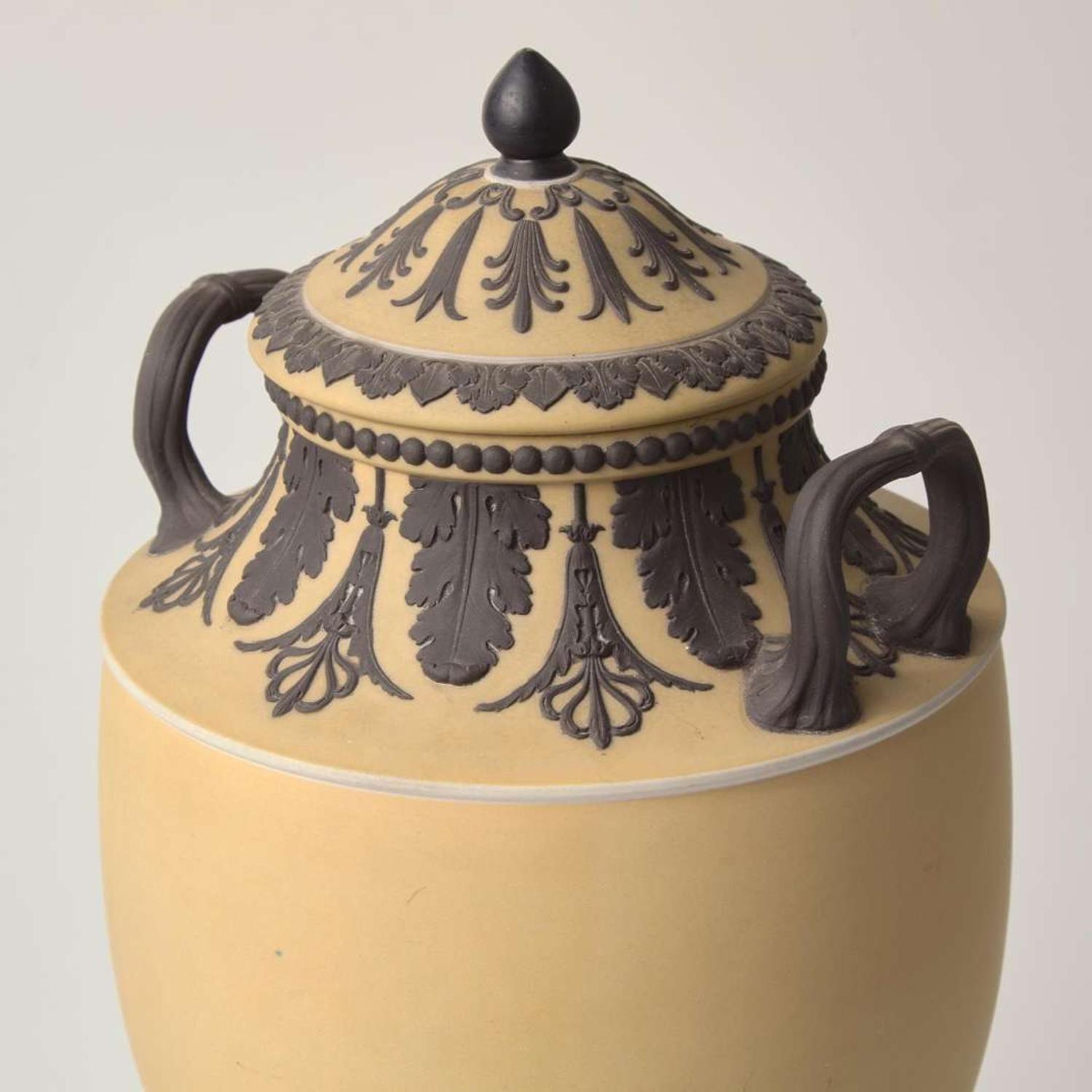 A Wedgwood Buff Yellow Dip and Solid Black Jasperware Vase and Cover UK, circa 1880