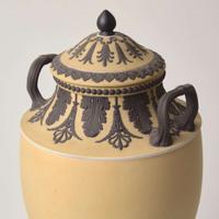 A Wedgwood Buff Yellow Dip and Solid Black Jasperware Vase and Cover UK, circa 1880