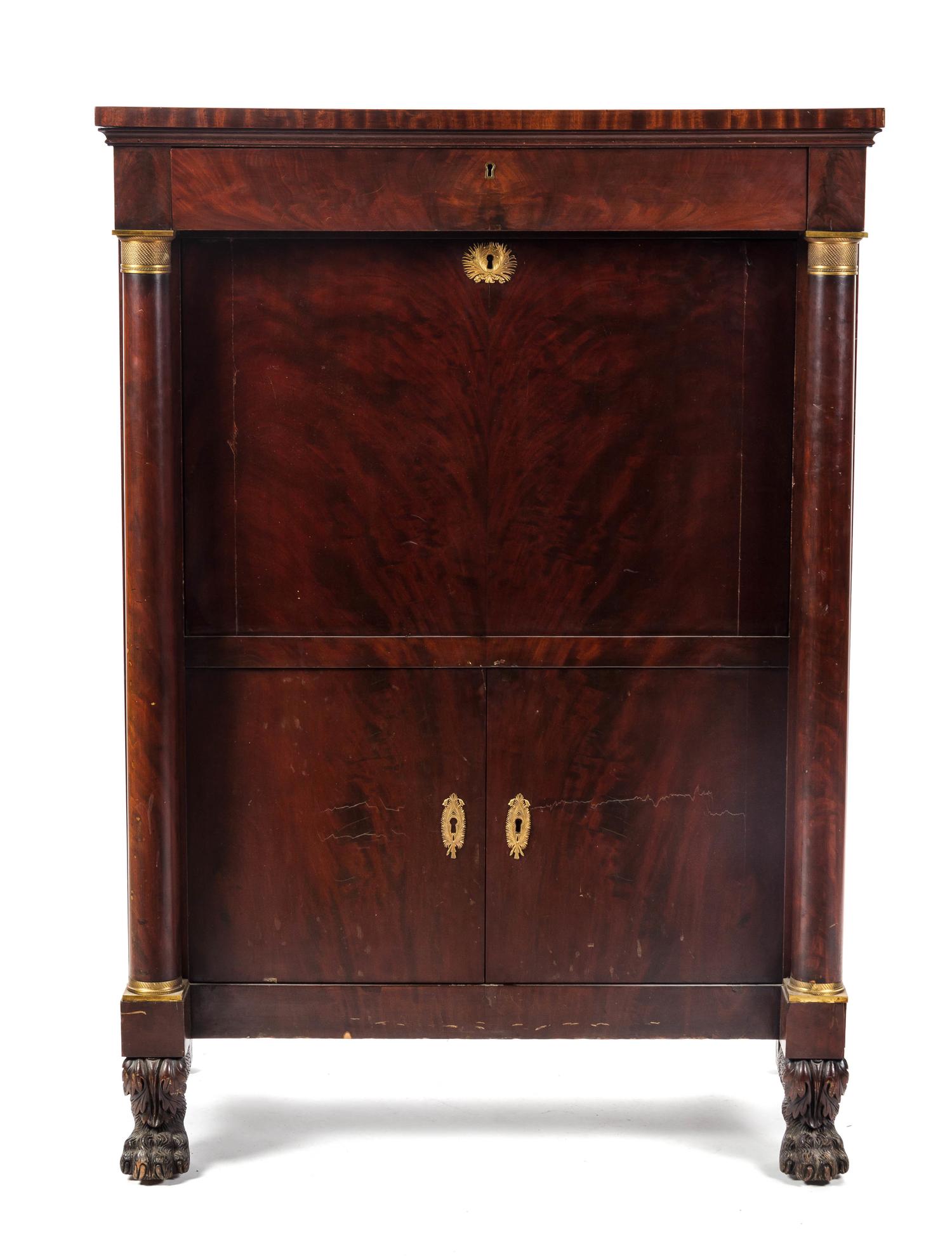 An Empire Gilt Metal Mounted Secretaire a Abbattant, Height 55 x width 39 x depth 20 inches.