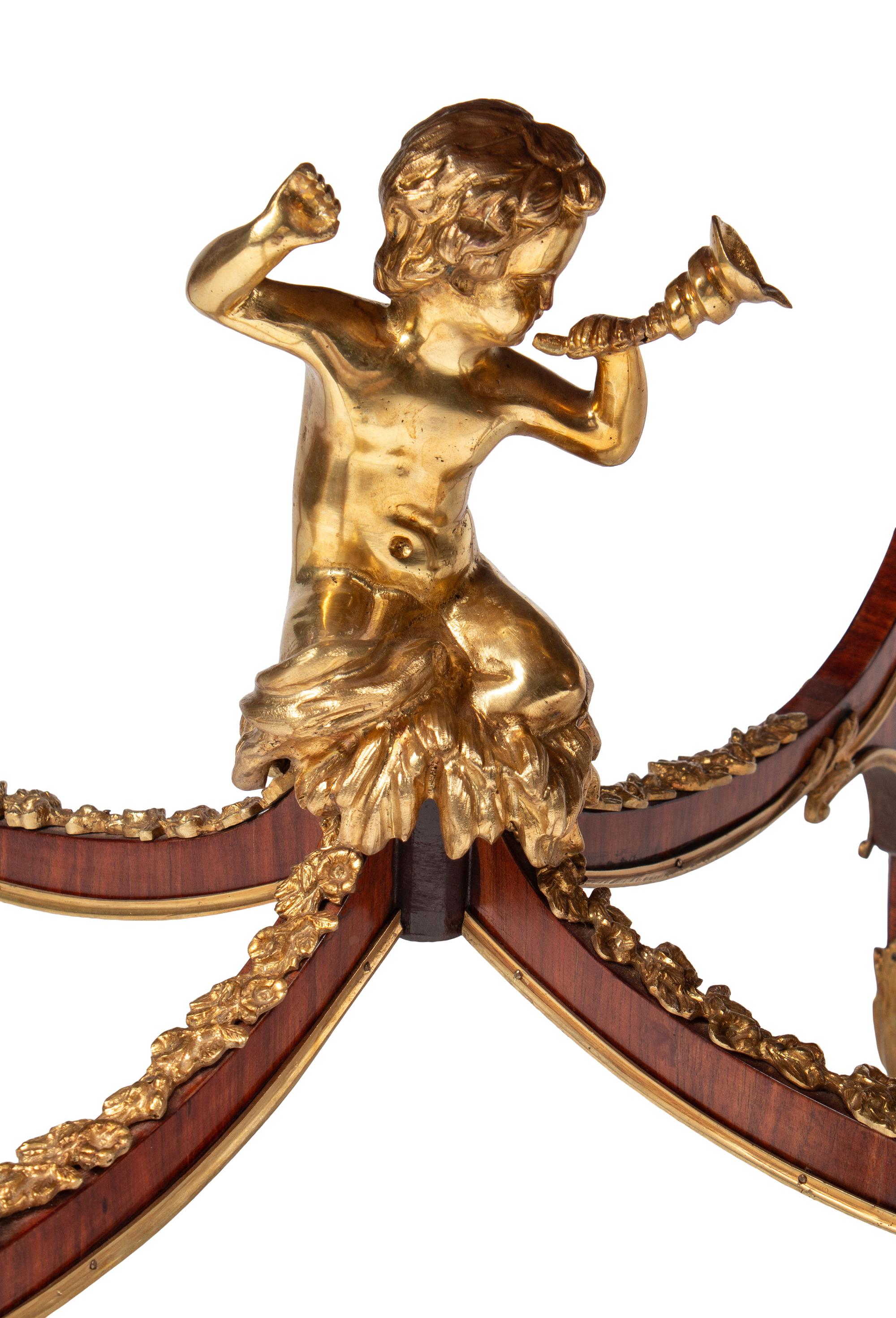 A Pair of Louis XV Style Gilt Bronze Mounted Marquetry Side Tables