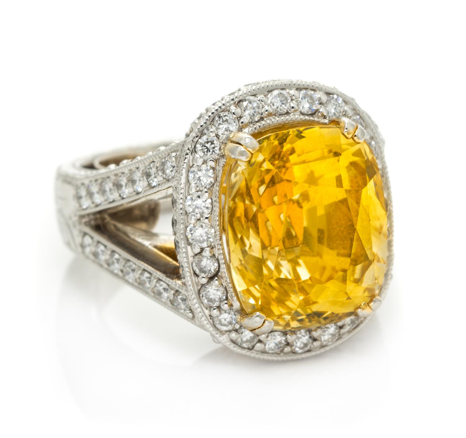 A Platinum, Gold, Yellow Sapphire and Diamond Ring, 15.80 dwts.