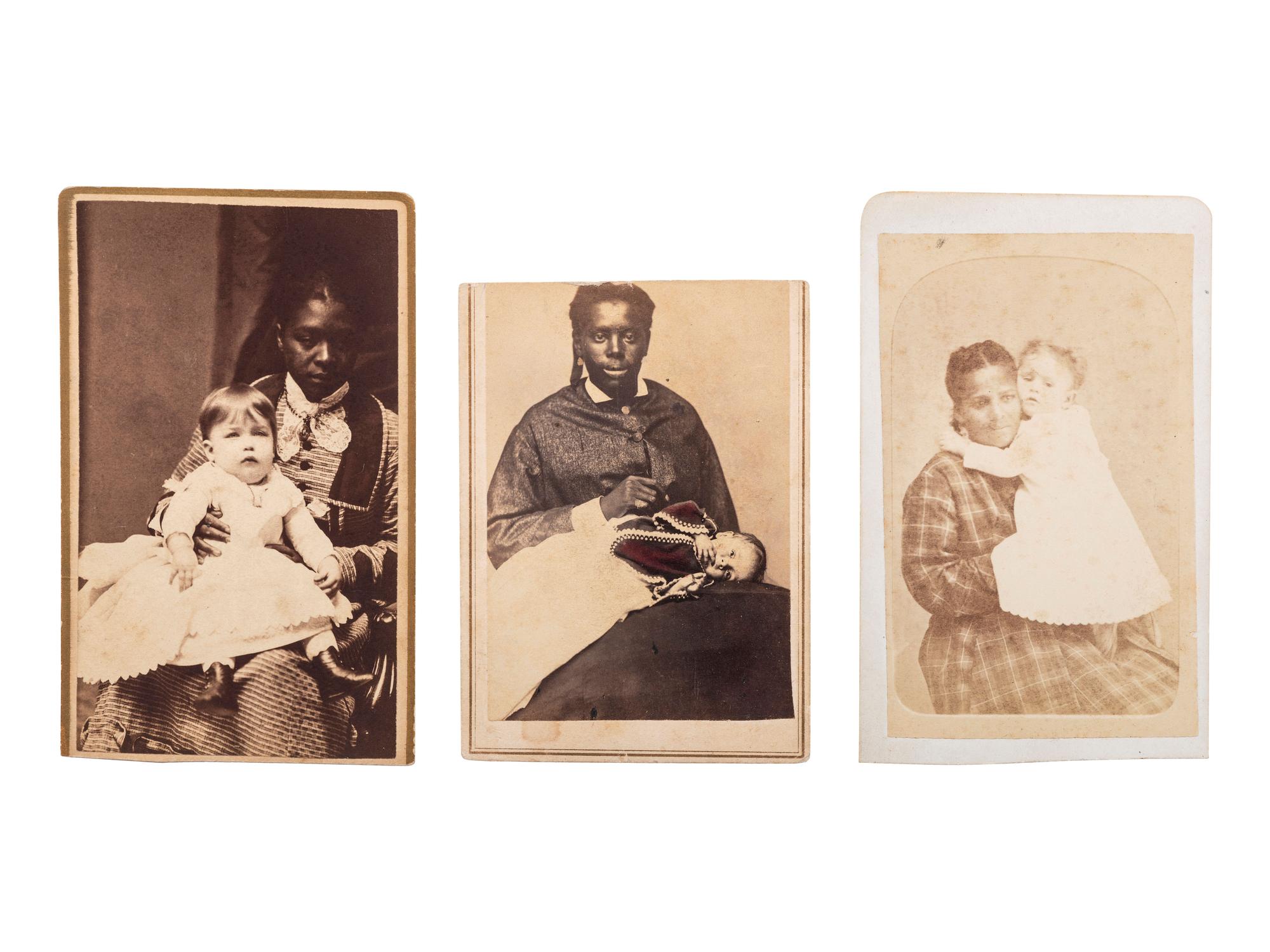[EARLY PHOTOGRAPHY]. A group of 3 CDVs of African American women with white infants, comprising:
