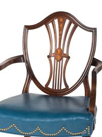 A Set of Eight Federal Style Inlaid and Volute-Carved Mahogany Shield-Back Dining Chairs