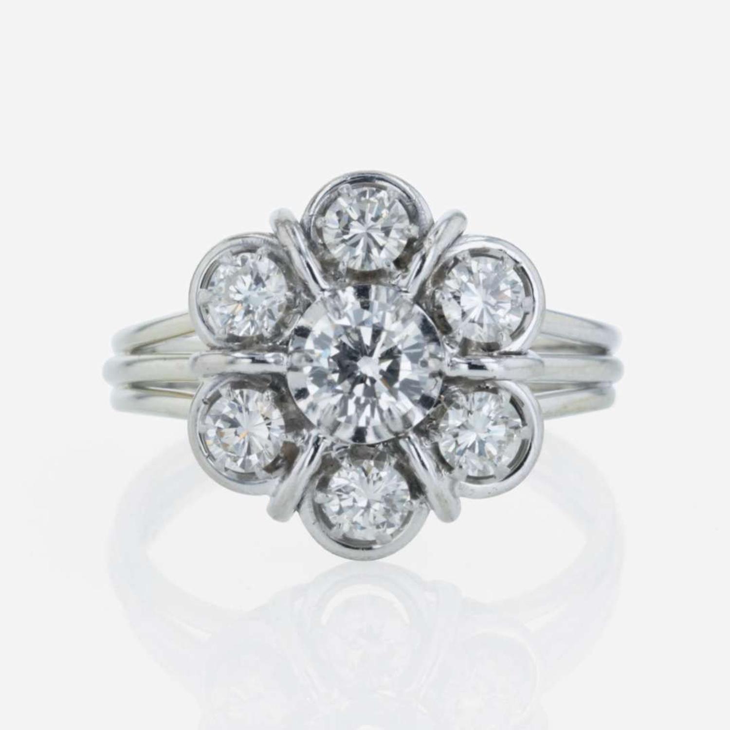 A 14K white gold and diamond ring