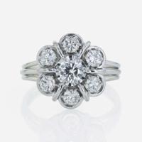 A 14K white gold and diamond ring