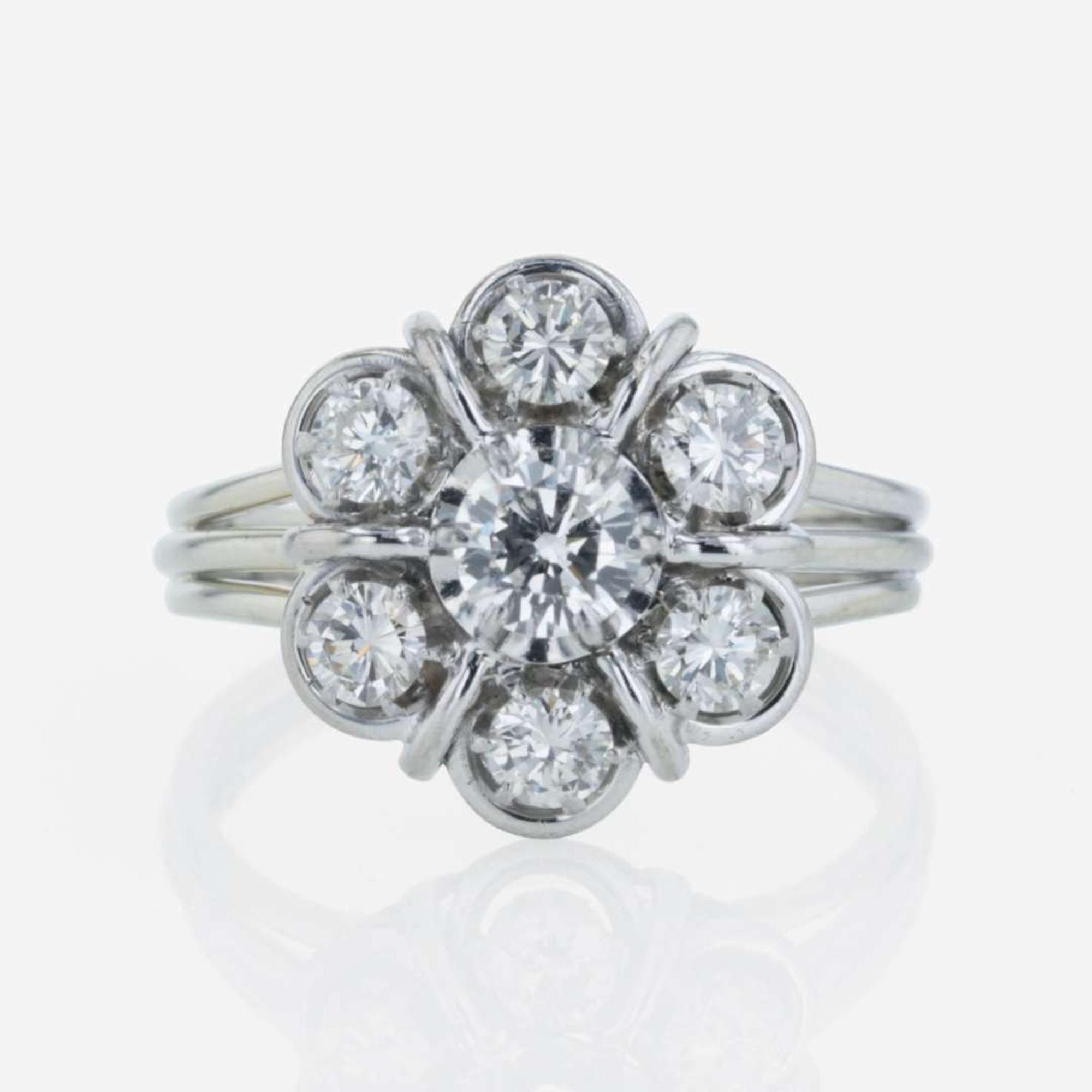 A 14K white gold and diamond ring