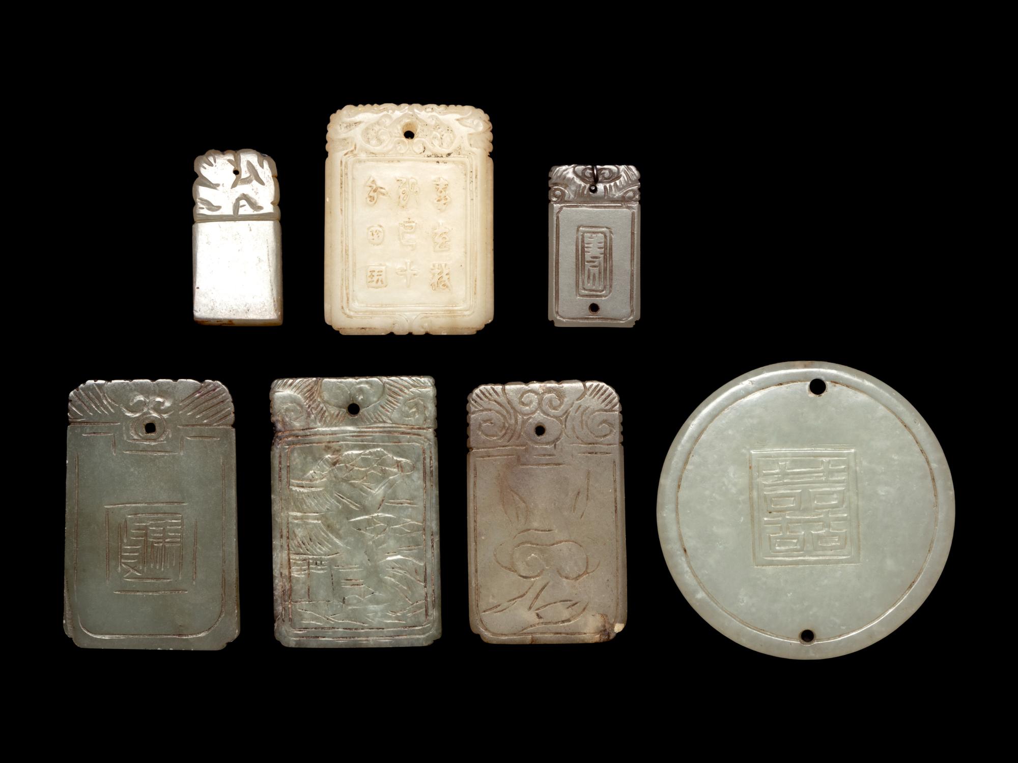 Seven Chinese White and Celadon Jade Carved Plaques