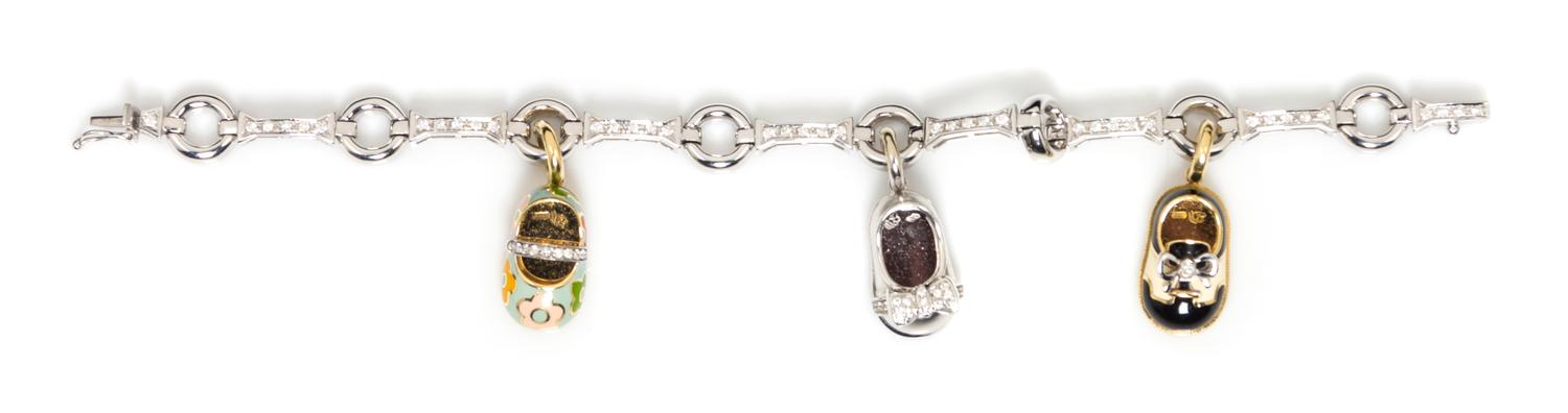 An 18 Karat Gold and Diamond Bracelet with Three Attached Charms, Aaron Basha, 25.40 dwts.