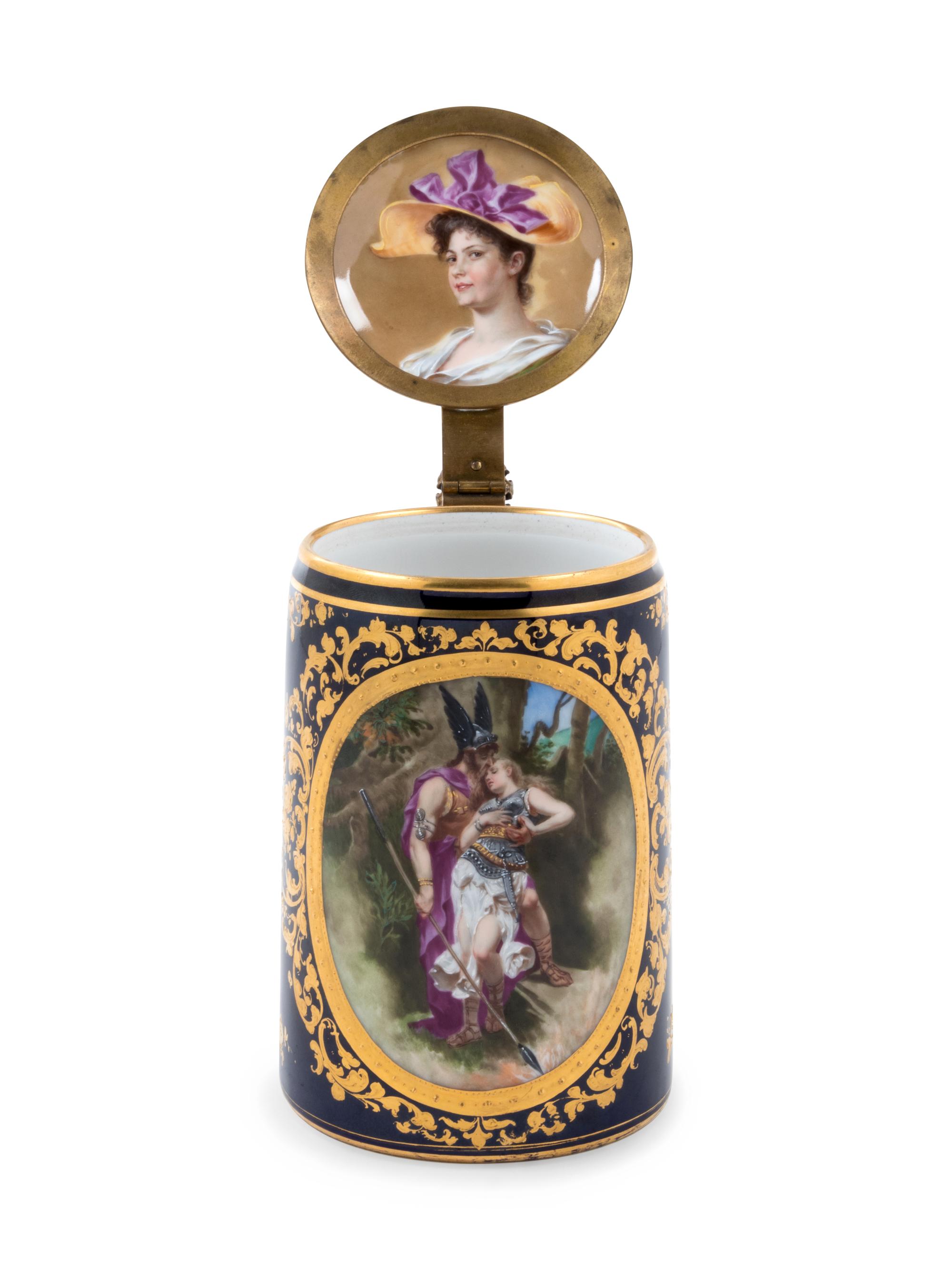 A Vienna Style Painted and Parcel Gilt Porcelain Tankard