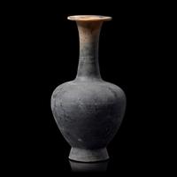 A Chinese Burnished Blackware Vase, Tang Dynasty 唐 黑陶長頸瓶