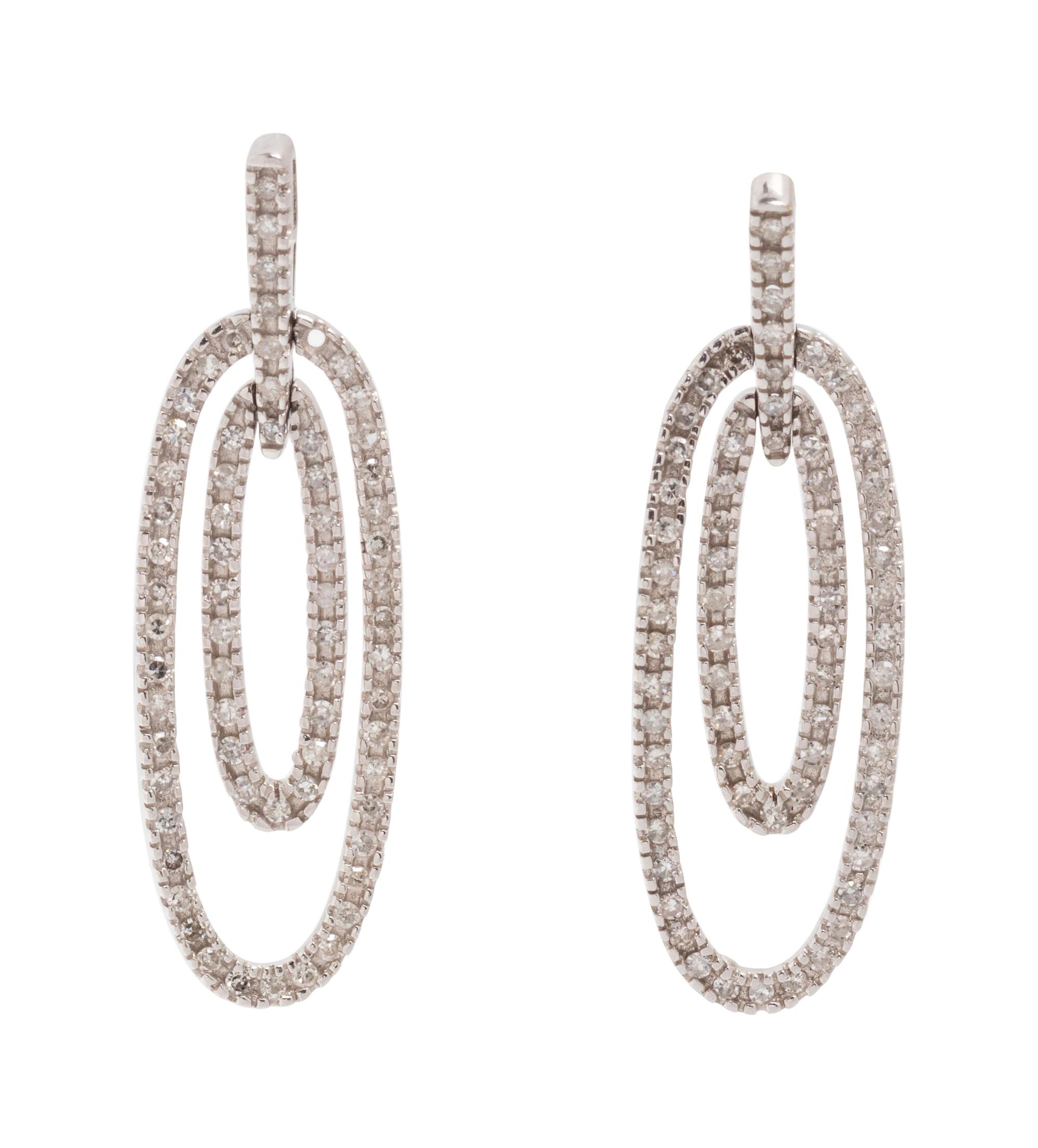 A Pair of 10 Karat White Gold and Diamond Earrings,