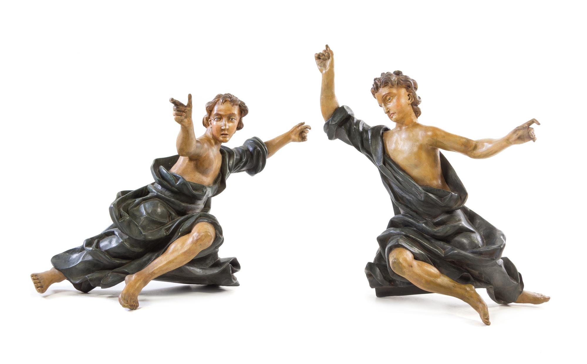 A Pair of Continental Carved and Polychrome Painted Ecclesiastical Figures Height 49 x width of wider 34 1/2 inches. — LATE 19TH CENTURY