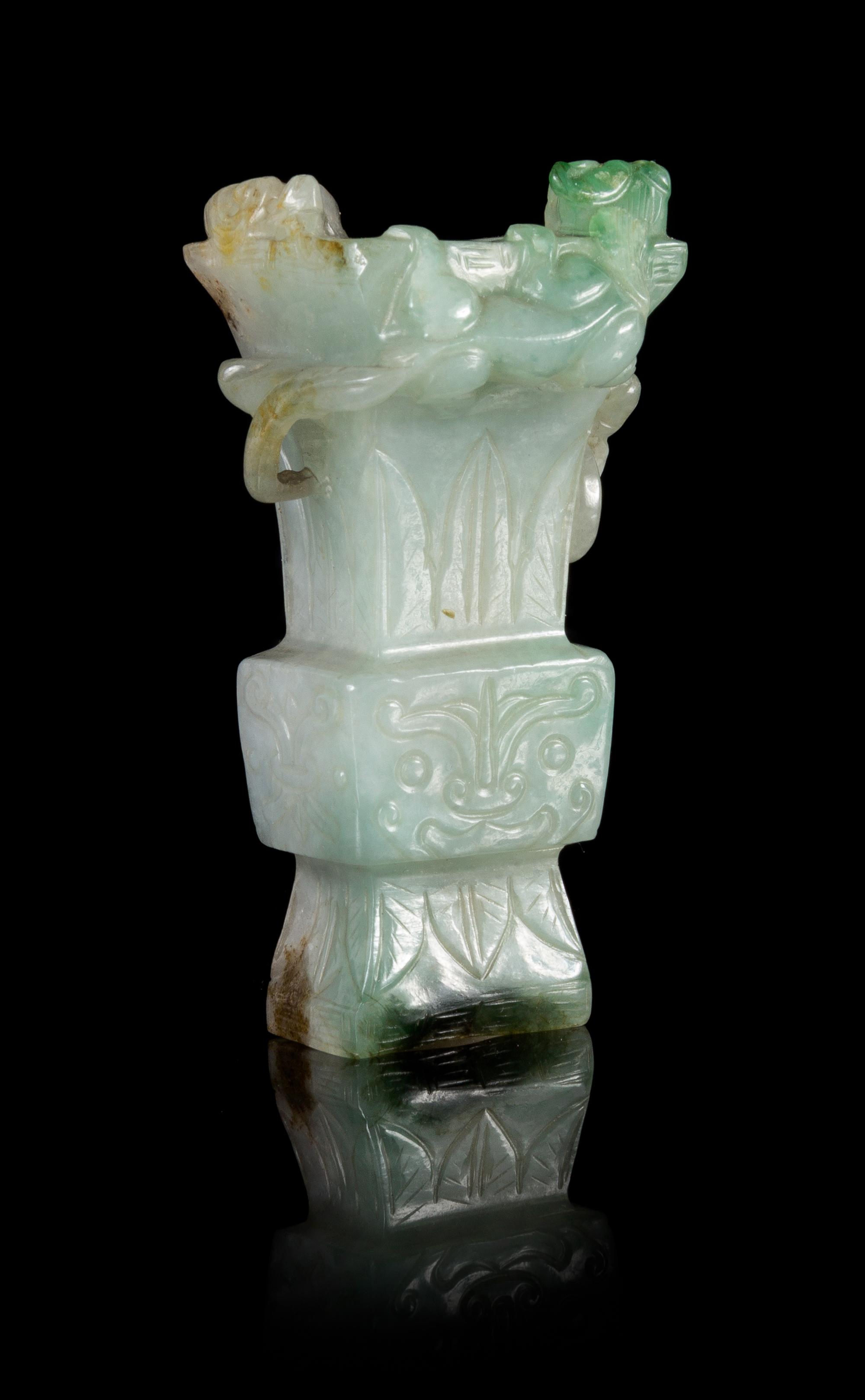 An Apple Green and Celadon Jadeite Miniature Vase Height 2 7/8 inches.