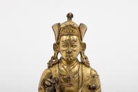 A Tibetan Gilt Bronze Figure of a Seated Karmapa