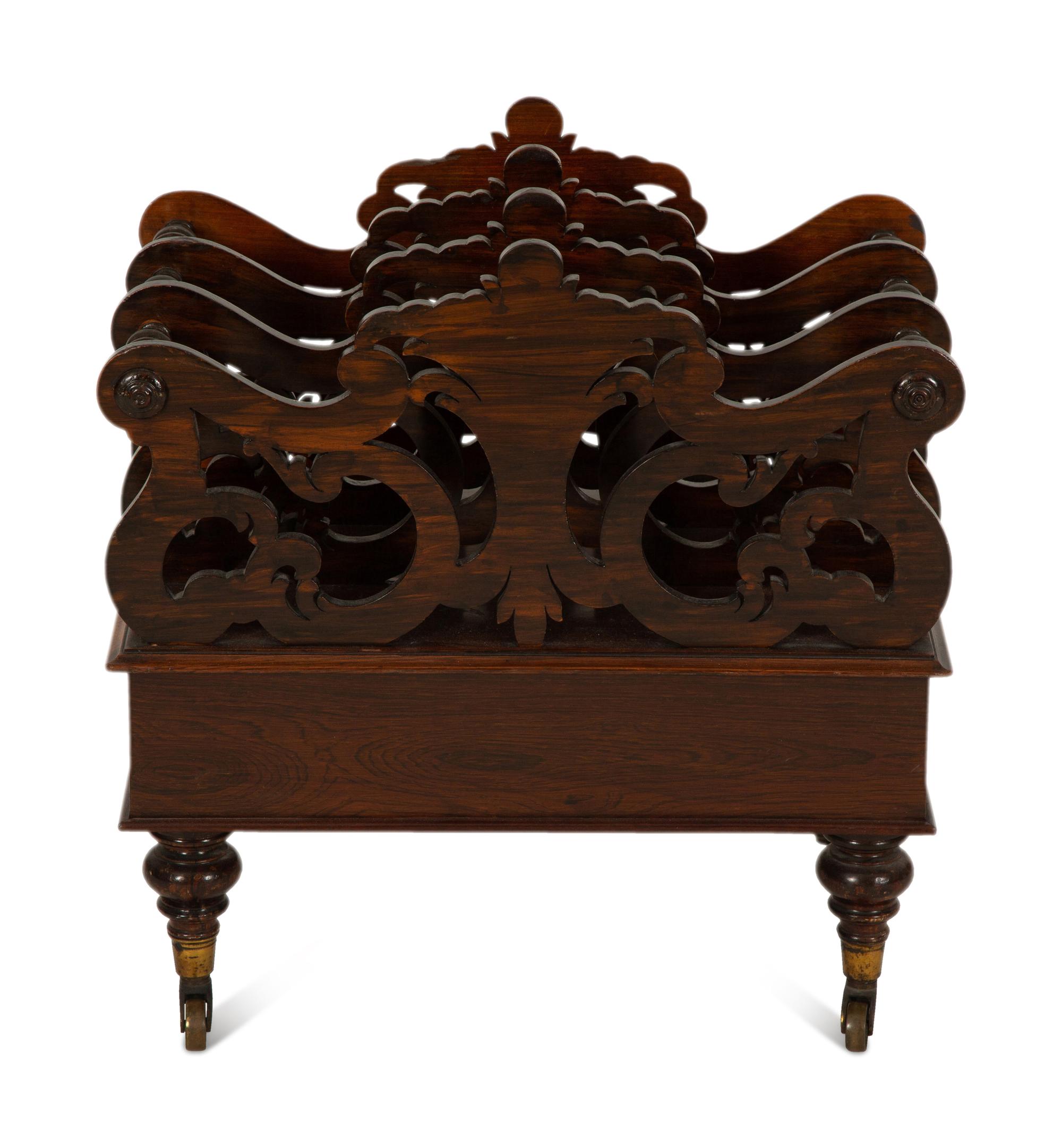 A Late Regency Carved Mahogany Canterbury