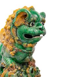A Pair of Chinese Sancai Glazed Porcelain Figures of Fu Lions