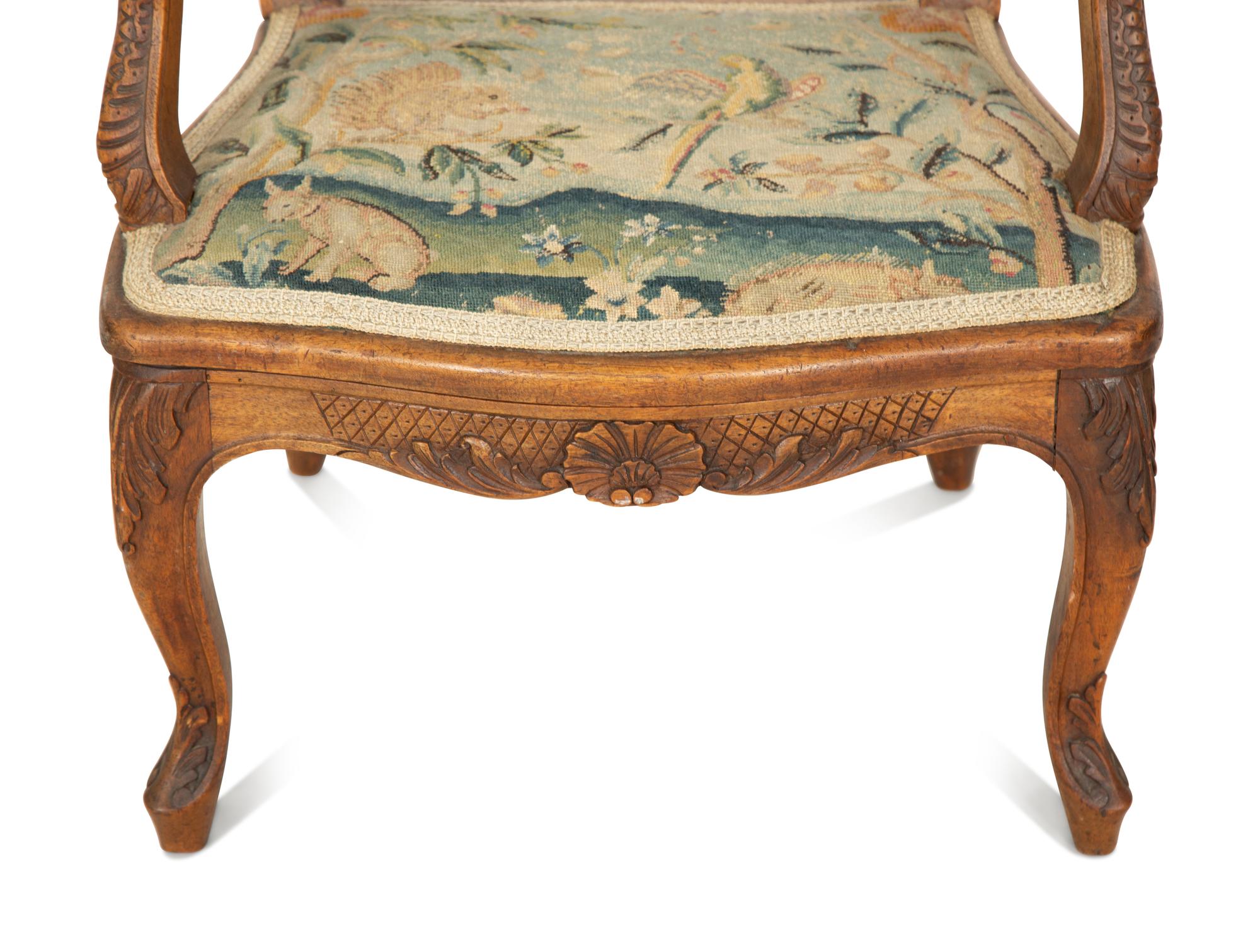 A Louis XV Style Carved Fruitwood Child's Chair