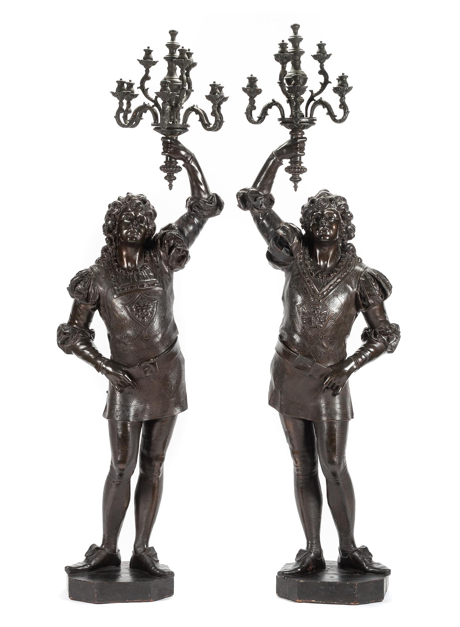 A Pair of Continental Carved Figural Torcheres Height 92 1/2 inches. — 19TH CENTURY