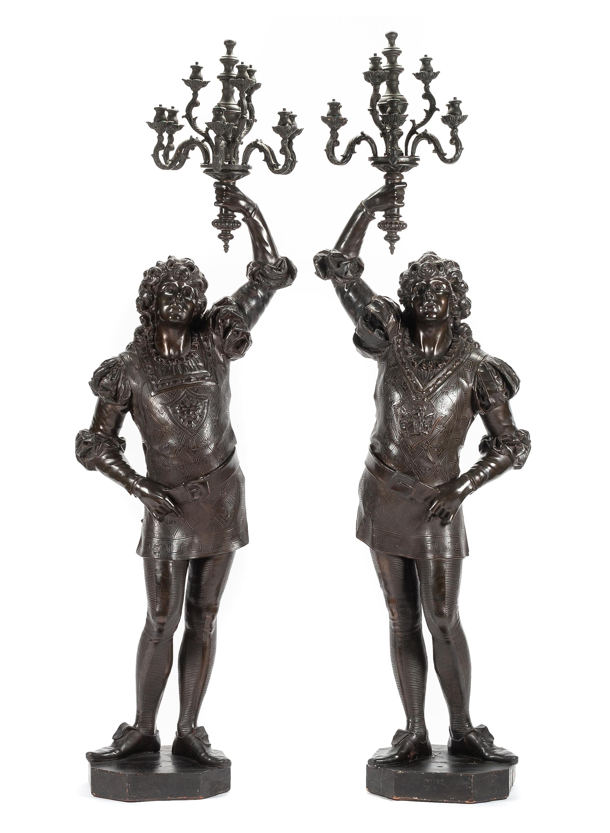 A Pair of Continental Carved Figural Torcheres Height 92 1/2 inches. — 19TH CENTURY