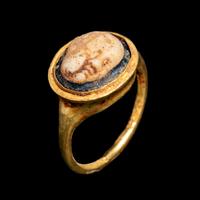 A Roman Gold Finger Ring with Glass Cameo of Eros