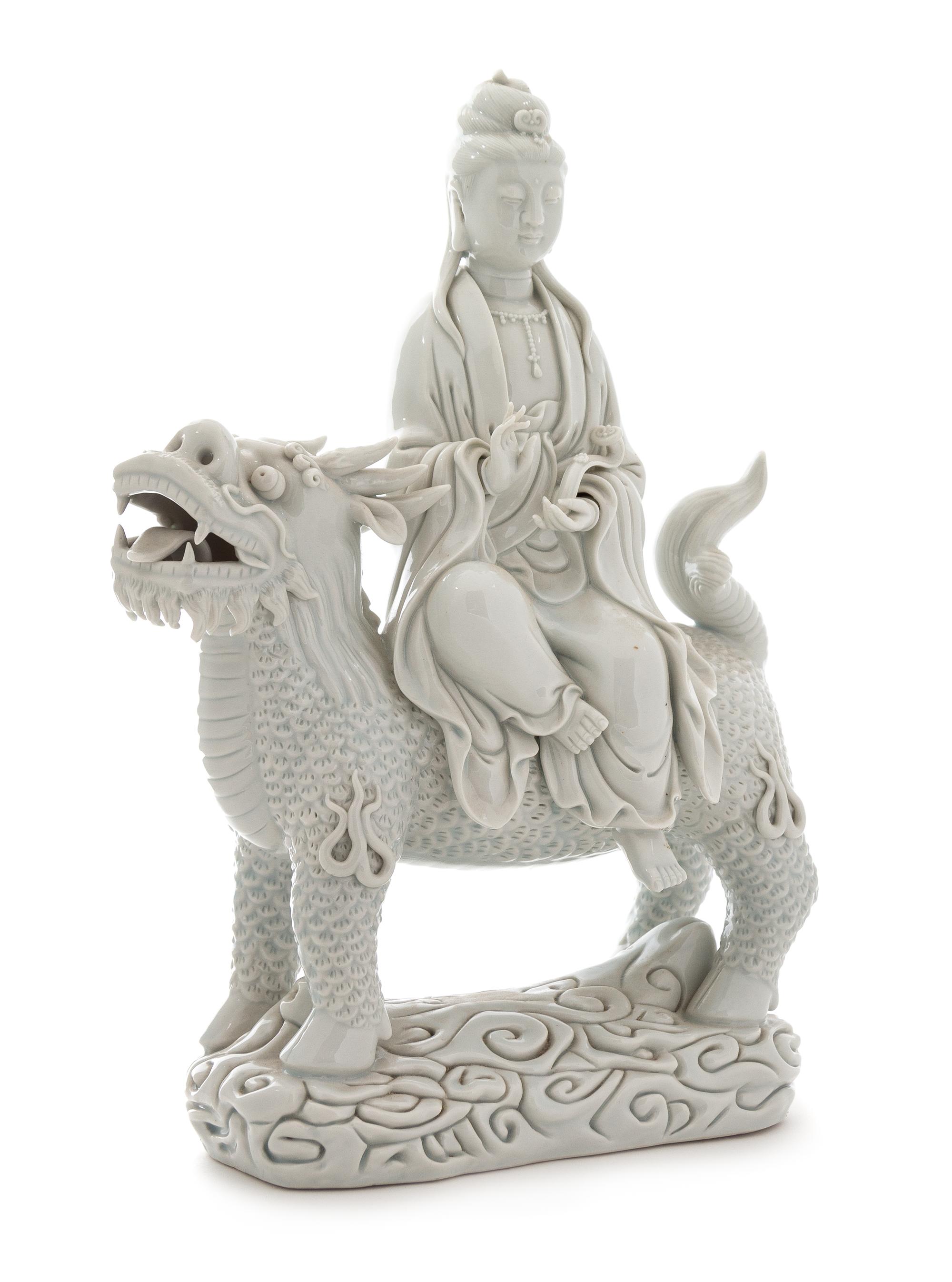 A Chinese Blanc-de-Chine Porcelain Figure of Guanyin Height 12 3/4 inches. — 18TH/19TH CENTURY