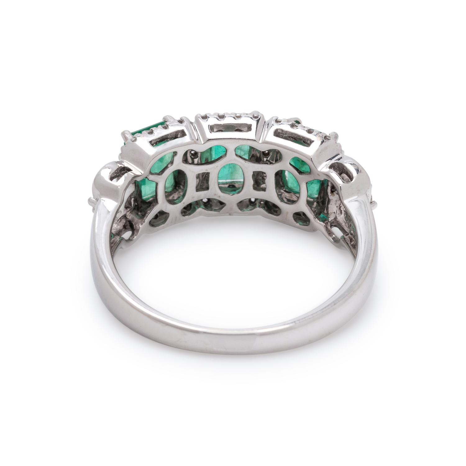 EMERALD AND WHITE ZIRCON RING