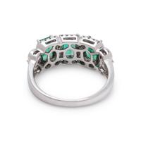 EMERALD AND WHITE ZIRCON RING