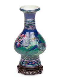A Chinese Blue Ground Famille Rose Vase with Stand