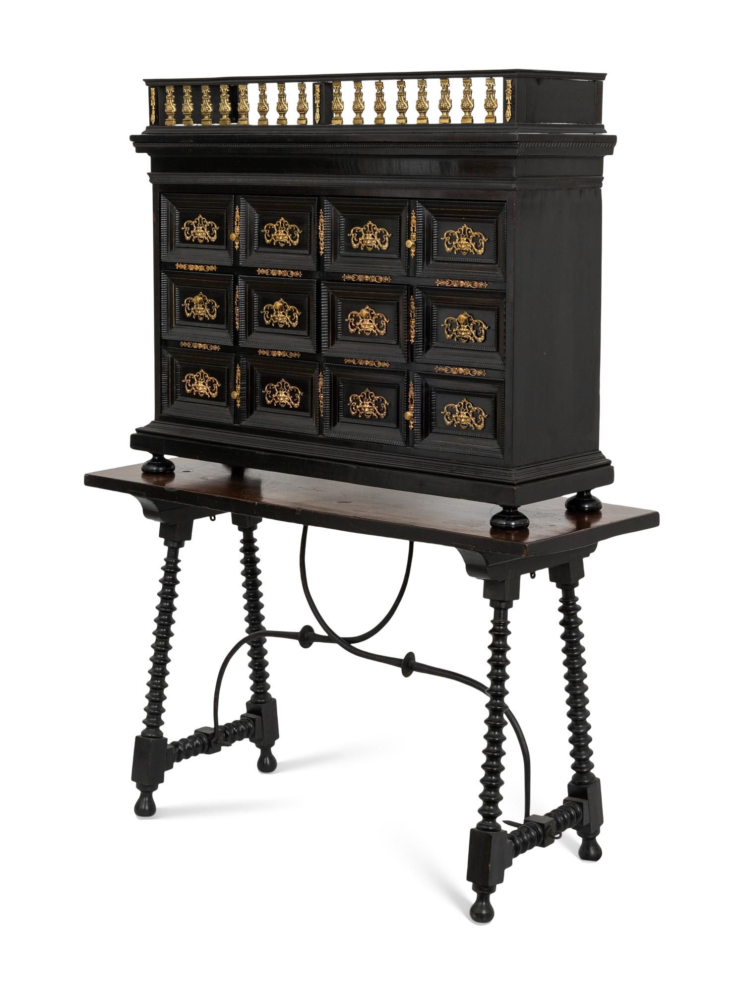 A Flemish Ebonized and Gilt Bronze Mounted Cabinet and Associated Spanish Renaissance Stand