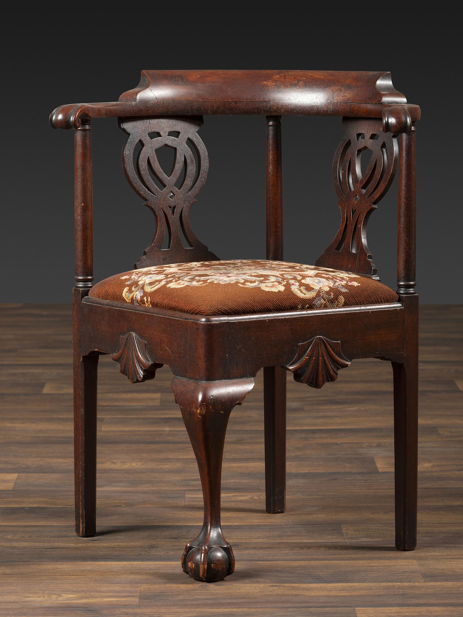 A Chippendale Shell-Carved Mahogany Knuckle-Arm Claw-and-Ball Foot Corner Chair