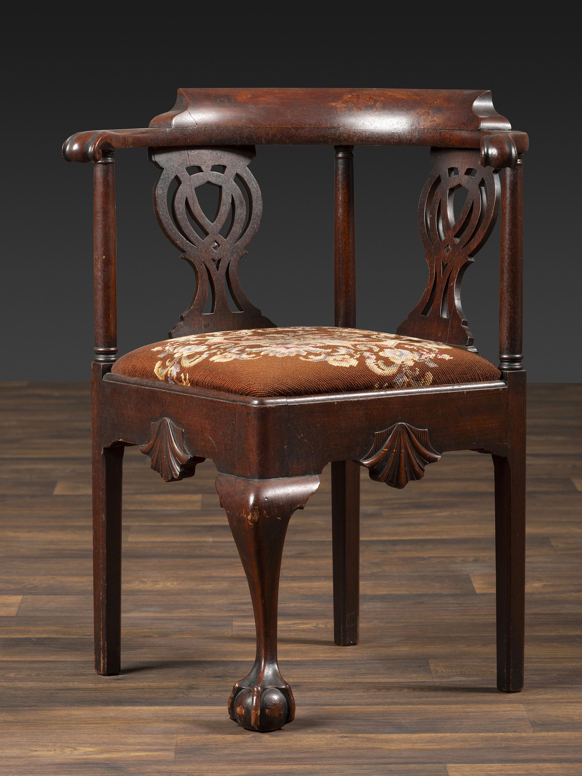 A Chippendale Shell-Carved Mahogany Knuckle-Arm Claw-and-Ball Foot Corner Chair