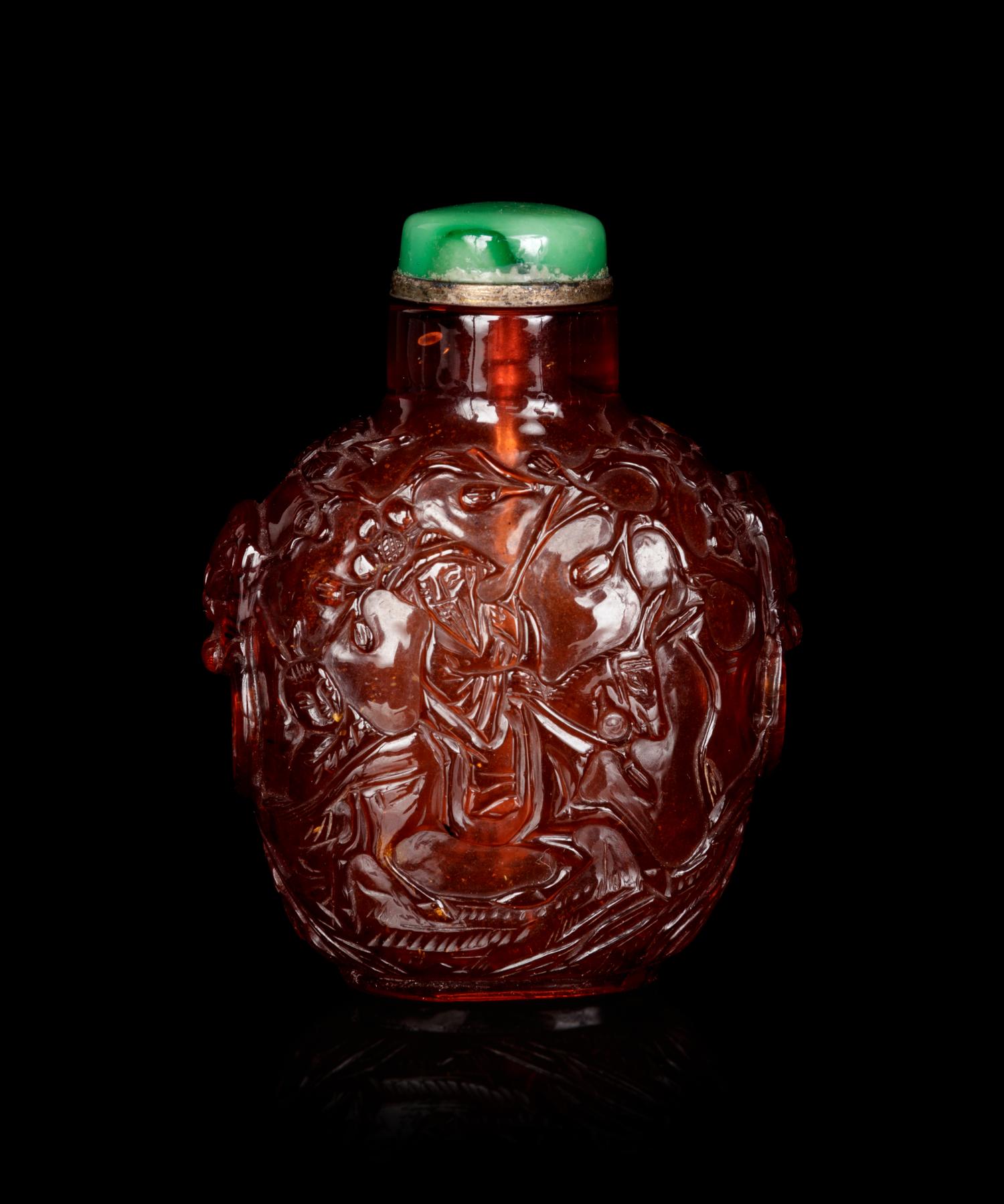 A Carved Amber Snuff Bottle