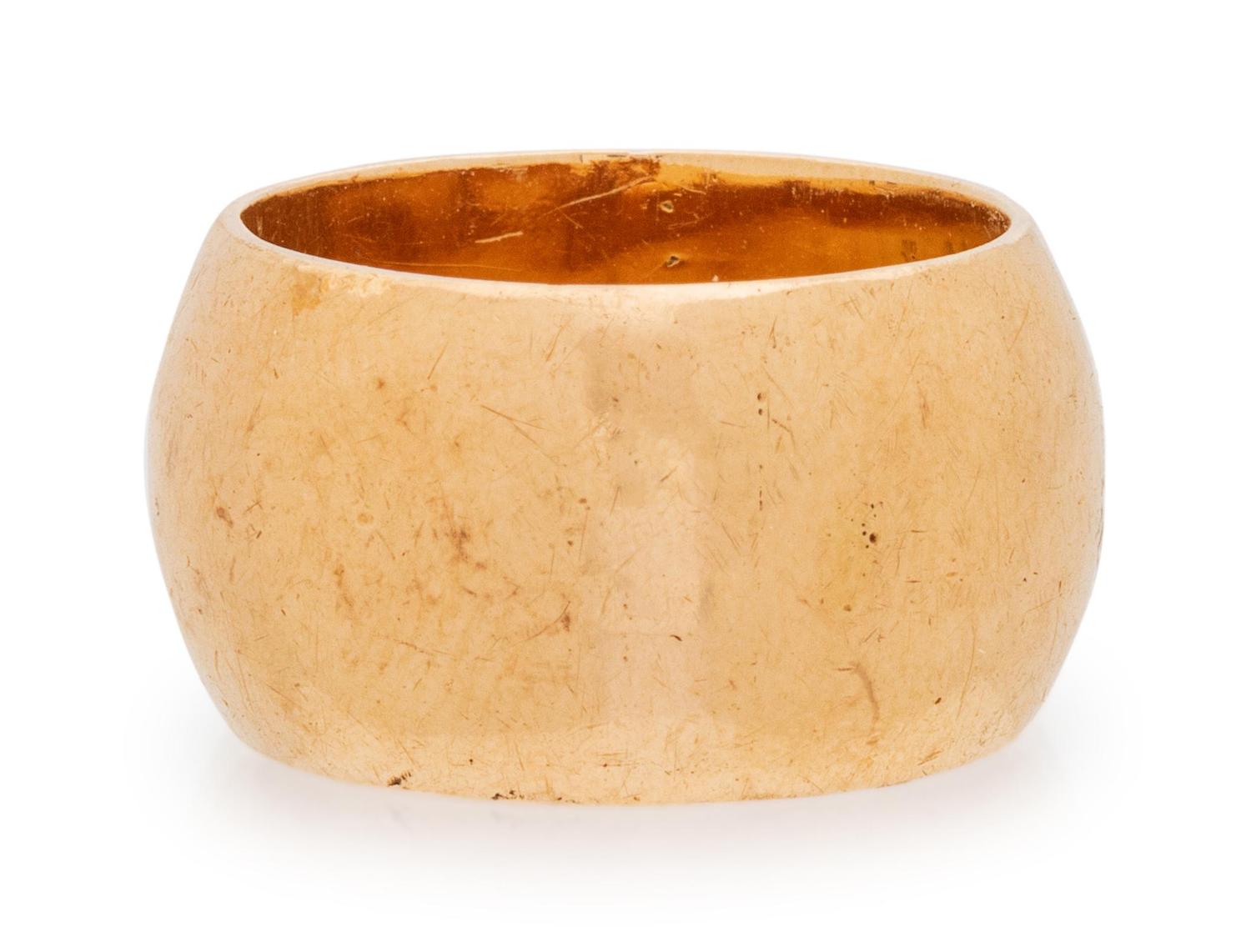 A 14 Karat Yellow Gold Band,