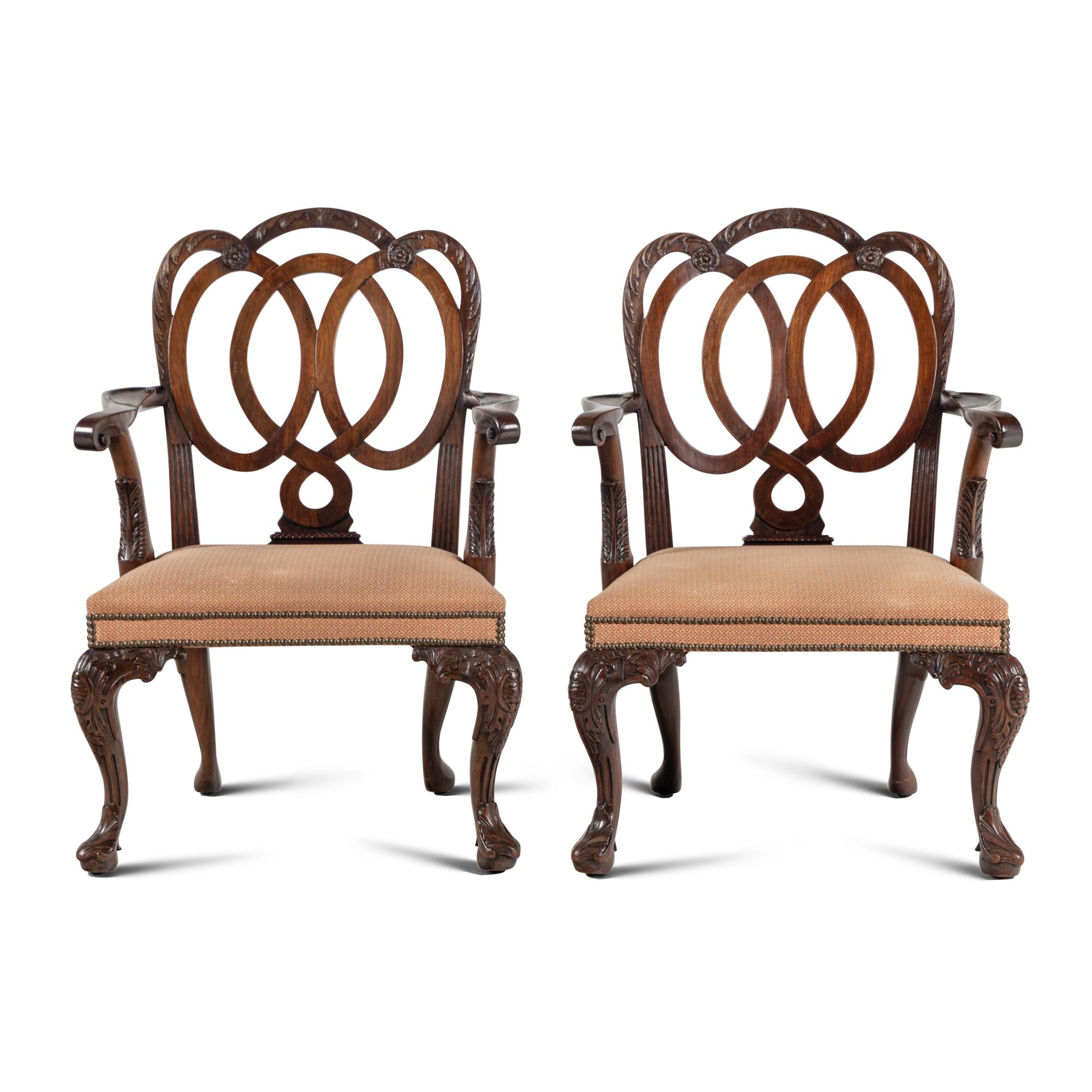 A Pair of Continental Mahogany Armchairs