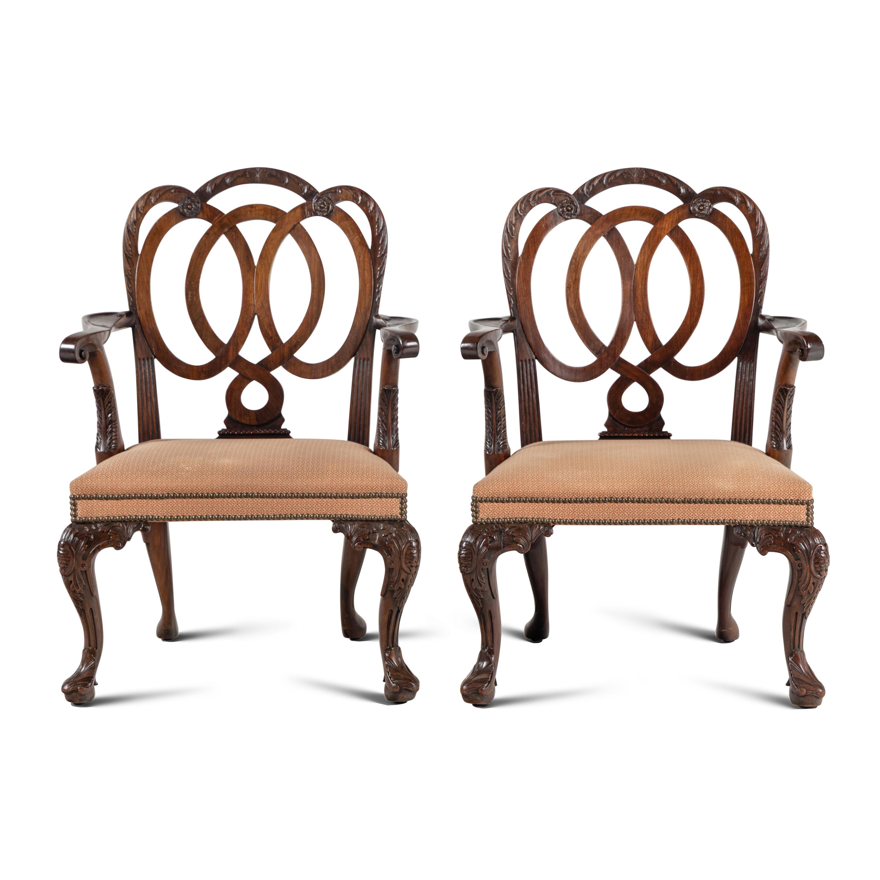 A Pair of Continental Mahogany Armchairs