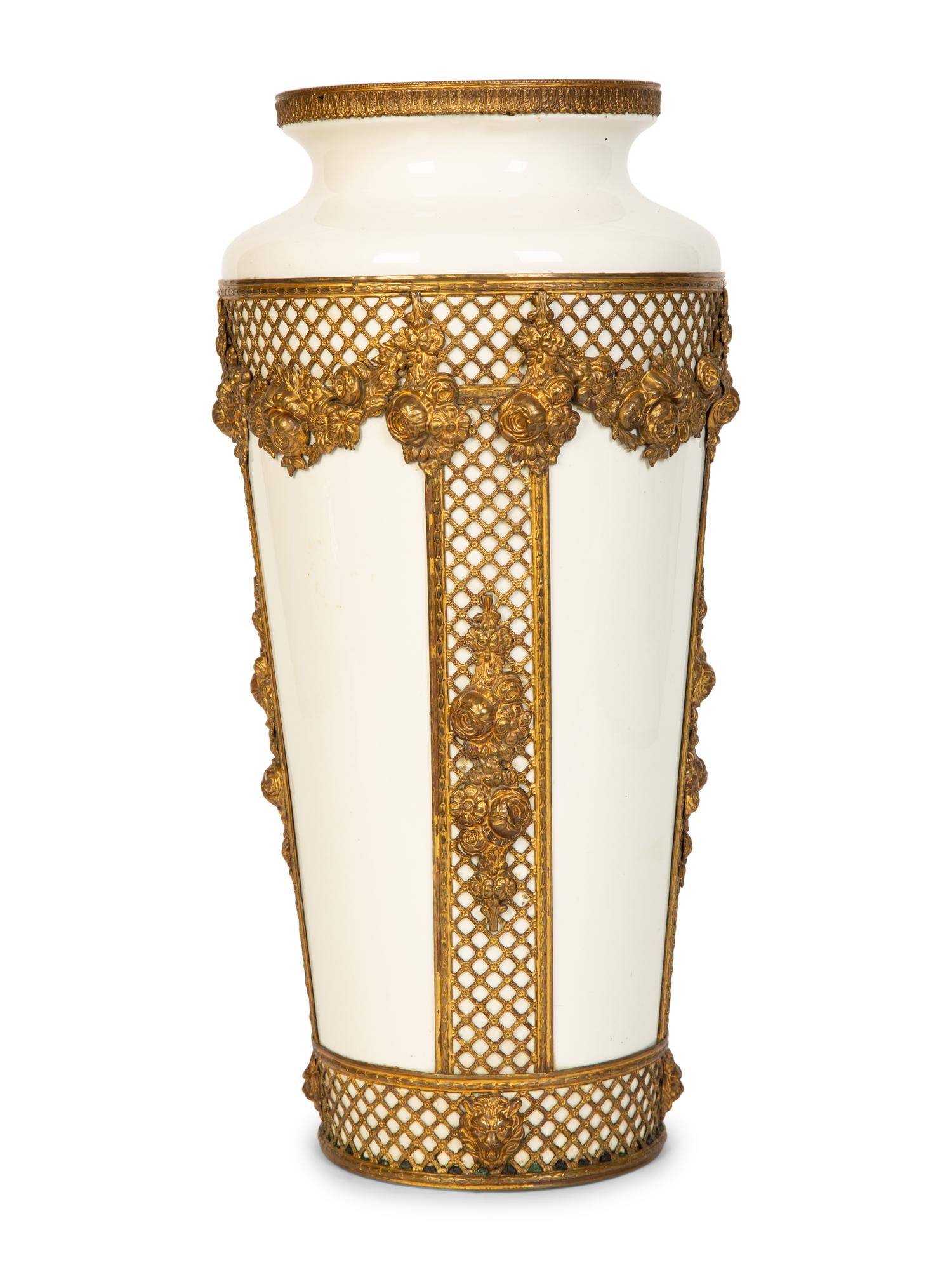 A Continental Gilt Metal Mounted Porcelain Vase
