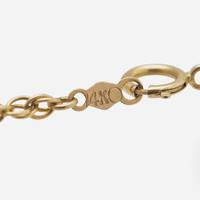 A Matching Set of 14K Yellow Gold, Diamond, and Emerald Necklace and Earrings