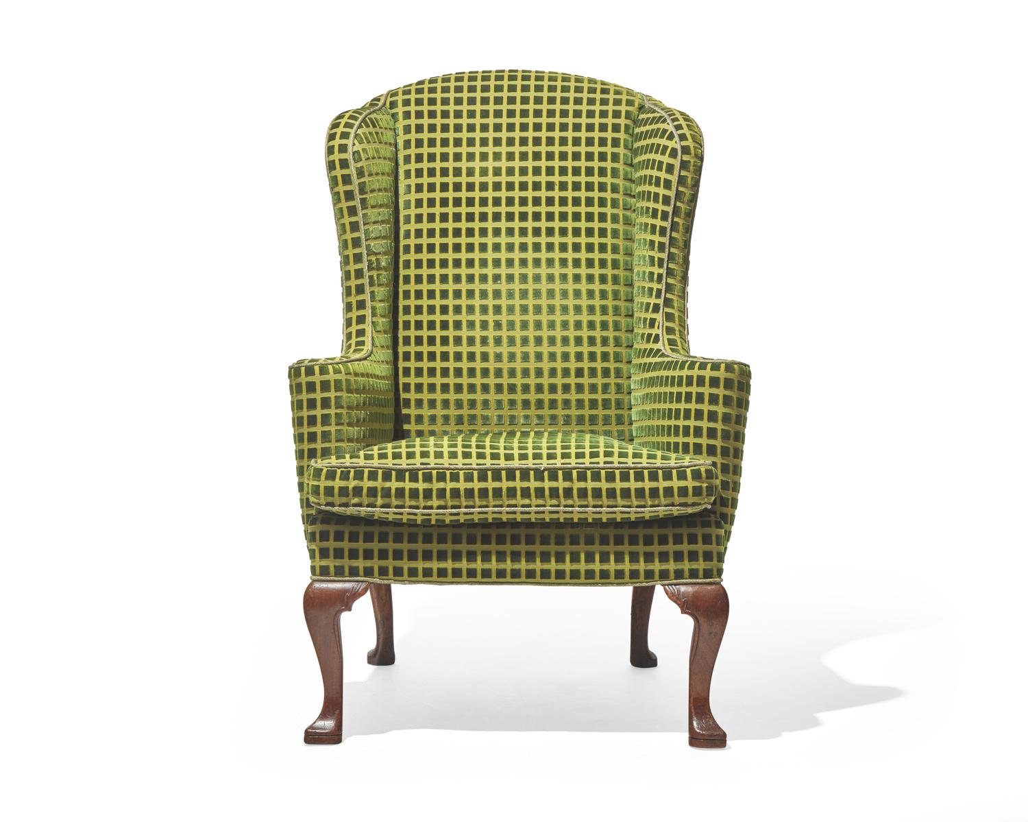 A George I walnut easy chair, circa 1710