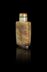 A Russet and Celadon Jade 'Kuilong' Snuff Bottle