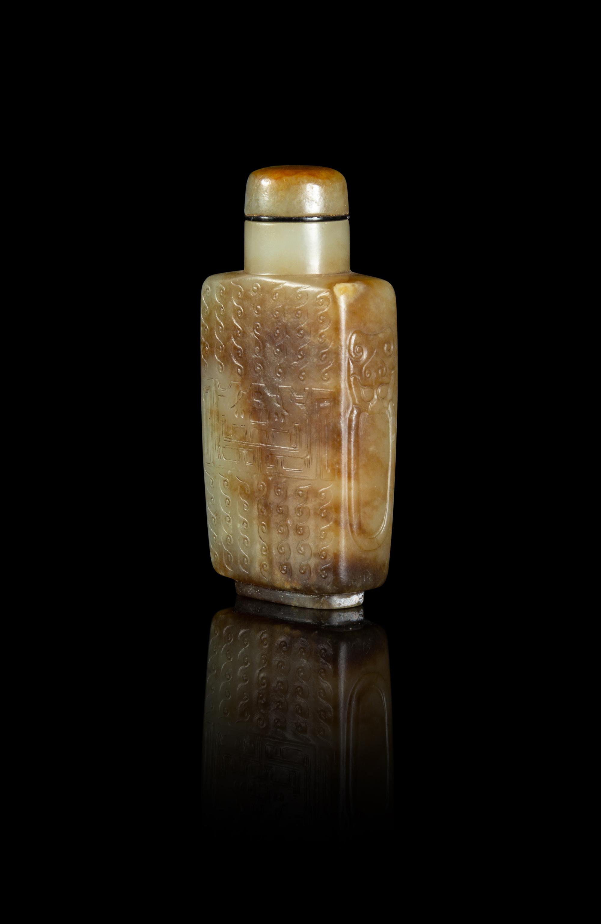 A Russet and Celadon Jade 'Kuilong' Snuff Bottle