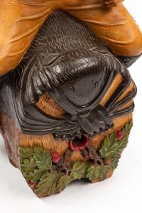 A Continental Painted Figure of a Man on a Barrel