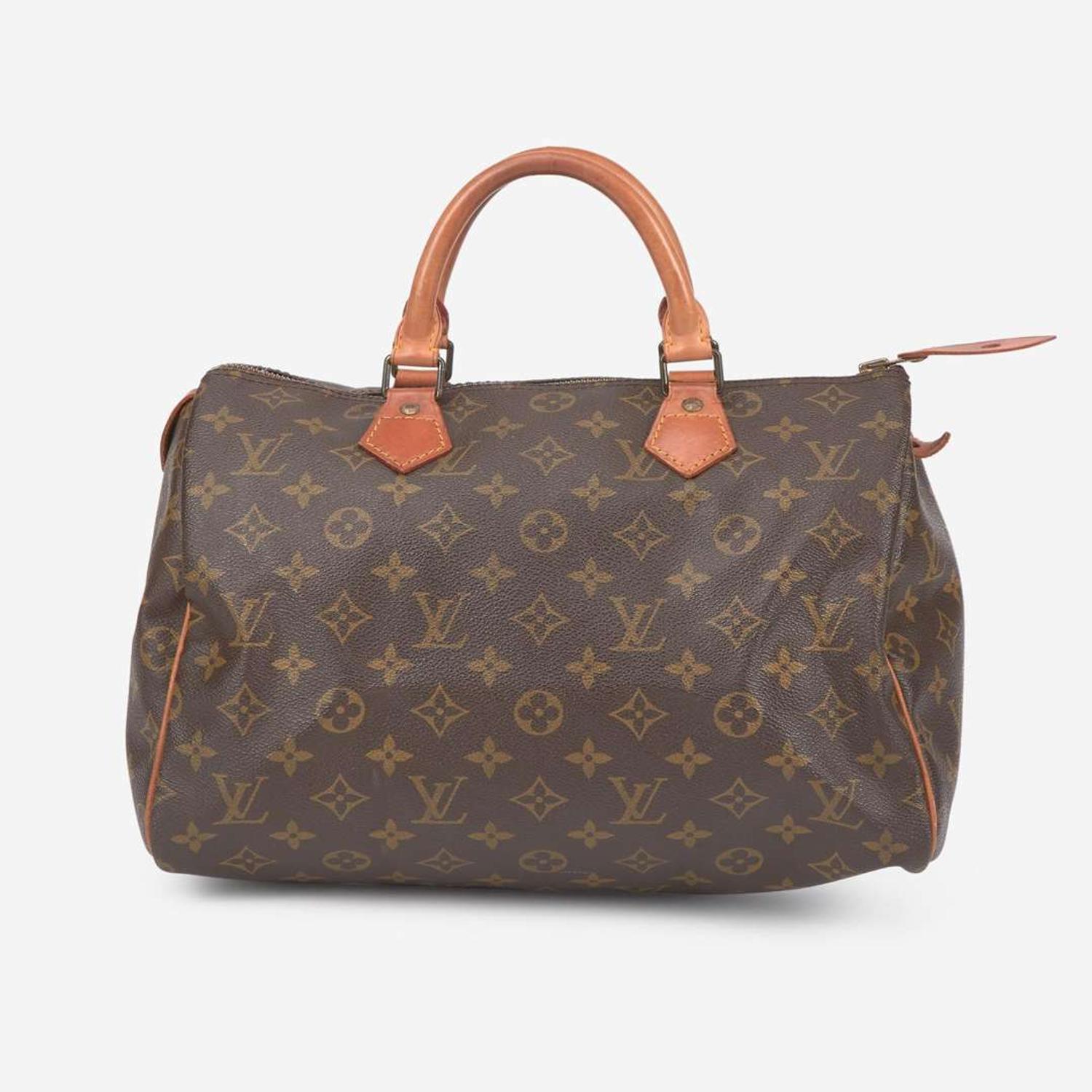 A Louis Vuitton Brown Monogram Speedy 30 Louis Vuitton