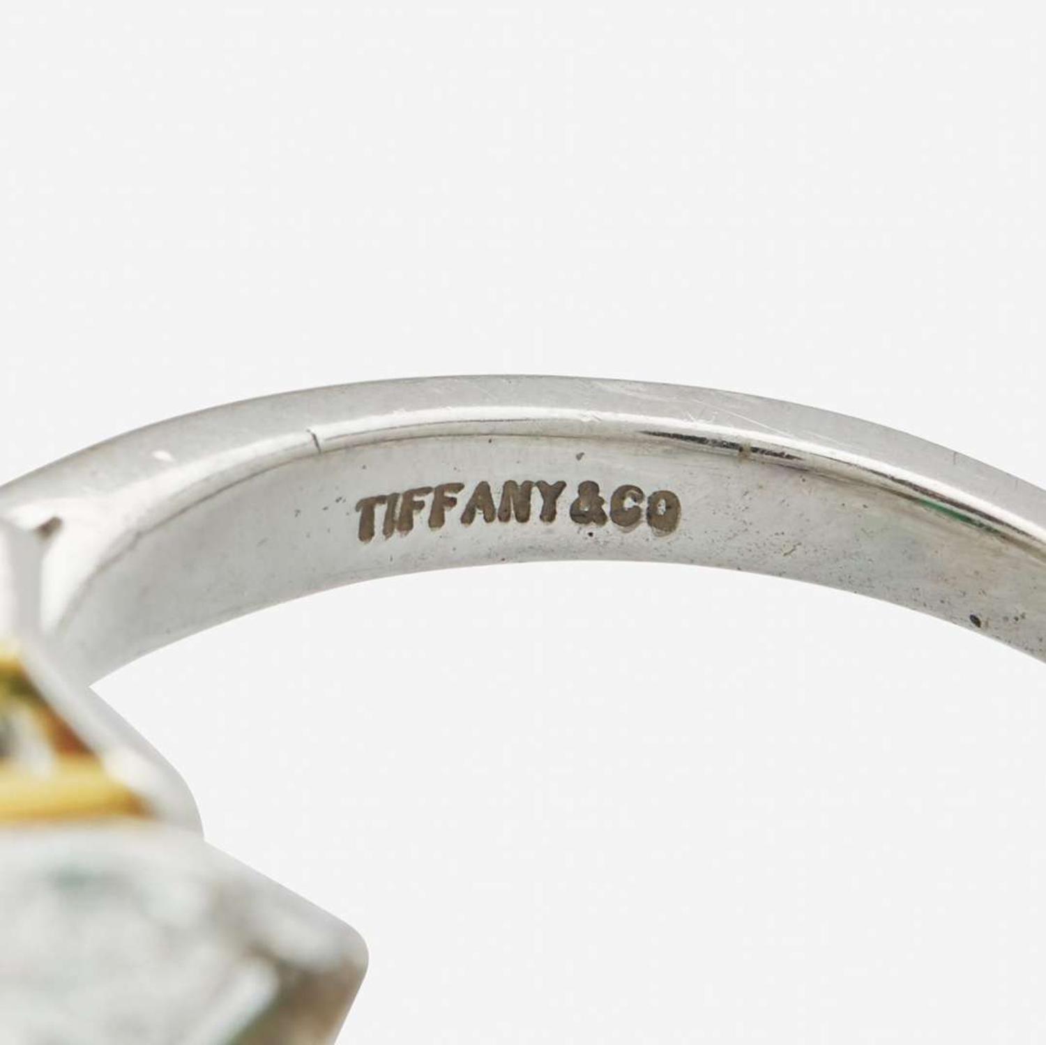 A Tiffany & Co. Platinum, Diamond, and Emerald Ring