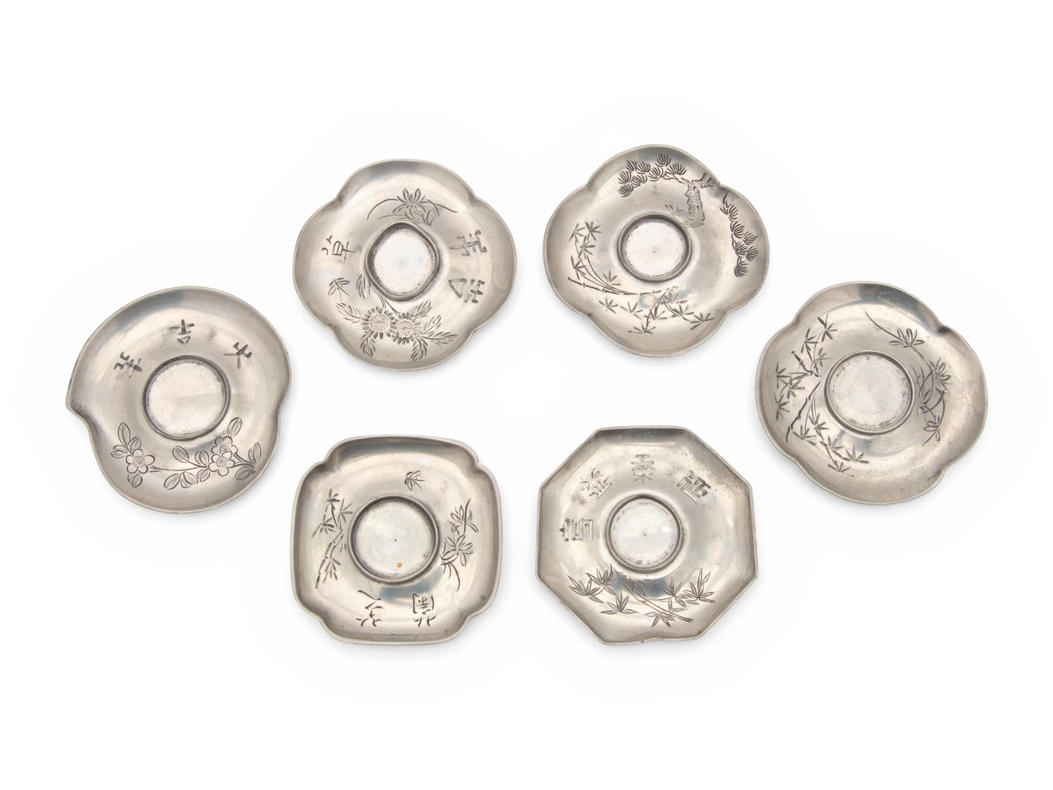 A Set of Six Chinese Pewter Cup Stands