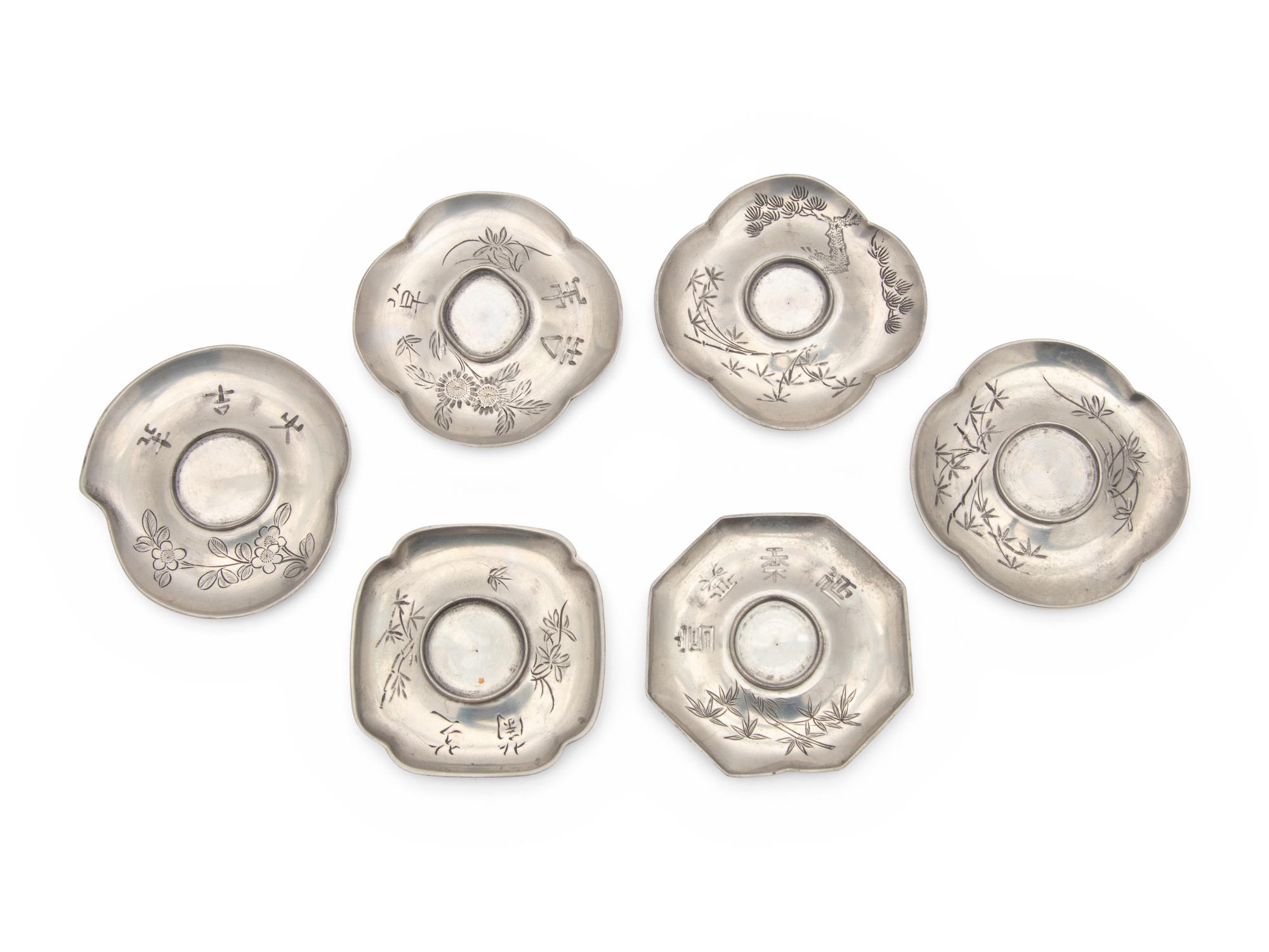 A Set of Six Chinese Pewter Cup Stands