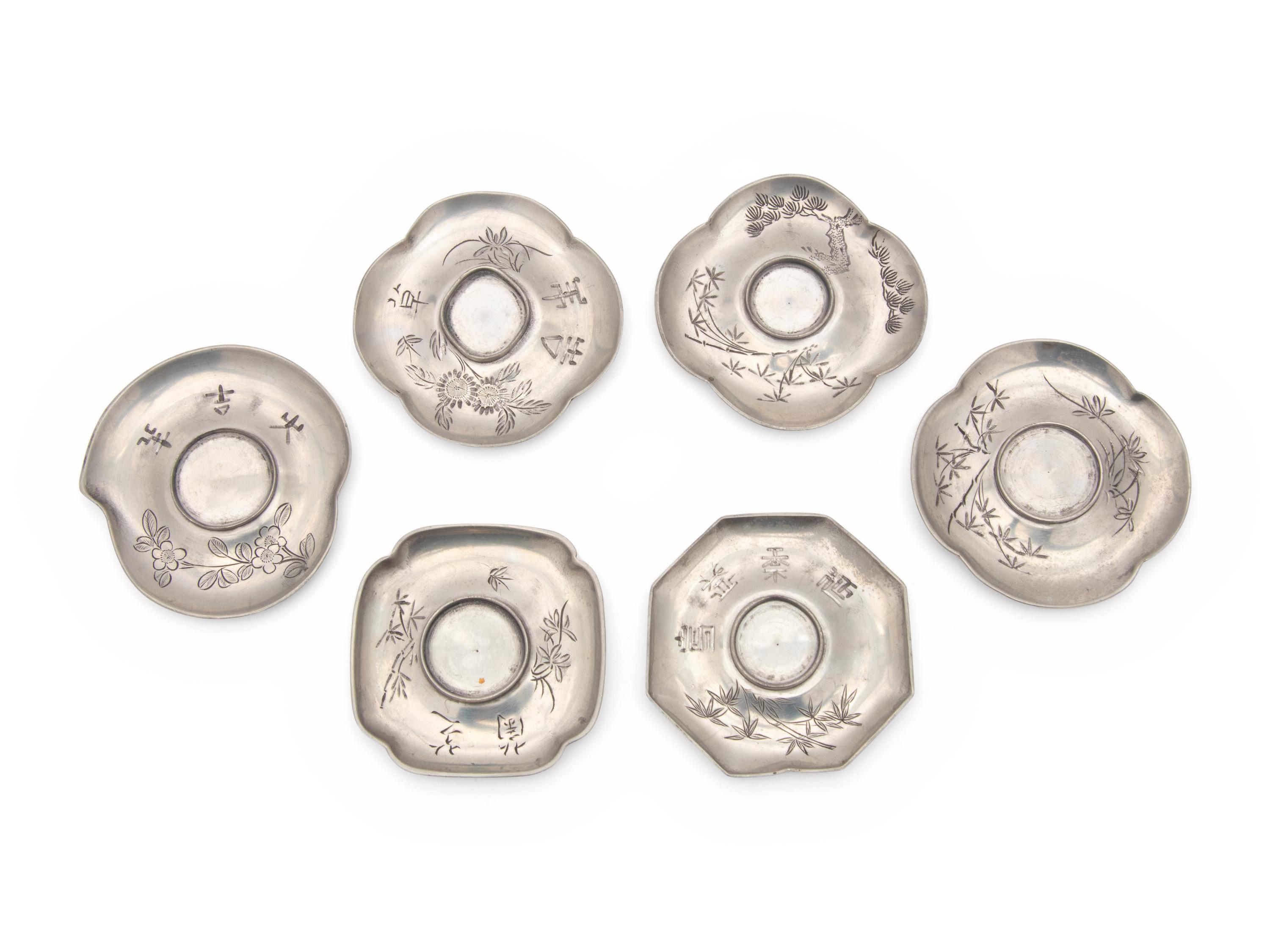 A Set of Six Chinese Pewter Cup Stands