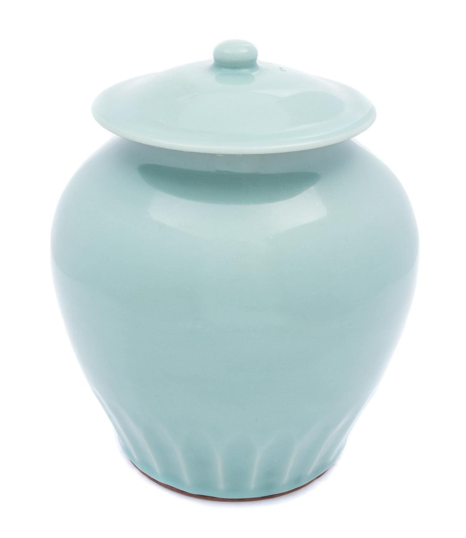 A Chinese Celadon Glazed Porcelain Covered Jar 18TH CENTURY Height 9 1/8 inches. — 18TH CENTURY