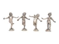 A Set of Four Buccellati Silver Putti Figures