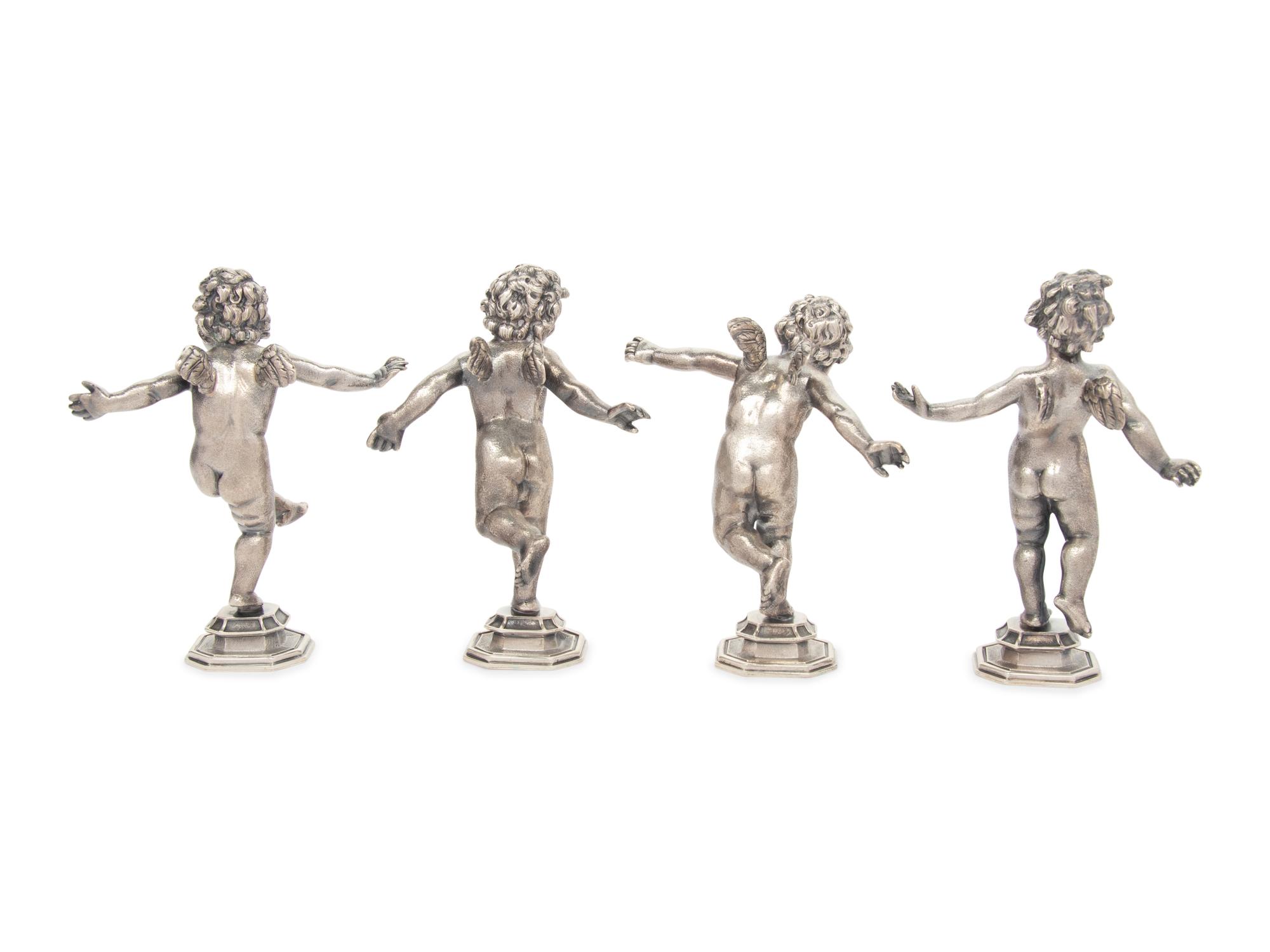 A Set of Four Buccellati Silver Putti Figures